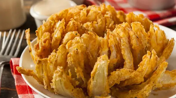 Outback Steakhouse's Loaded Bloomin' Onion Is Back With A New Shark Cocktail