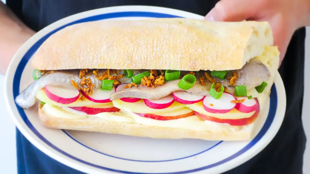 This deluxe herring sandwich is almost as tasty as your favorite hamburger