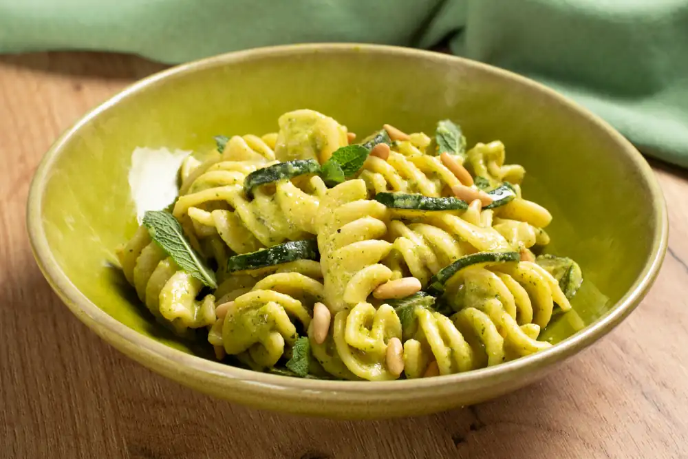 Pasta with zucchini cream and lemon-turmeric goat cheese