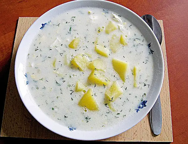 Hearty sour soup with dill and boiled eggs