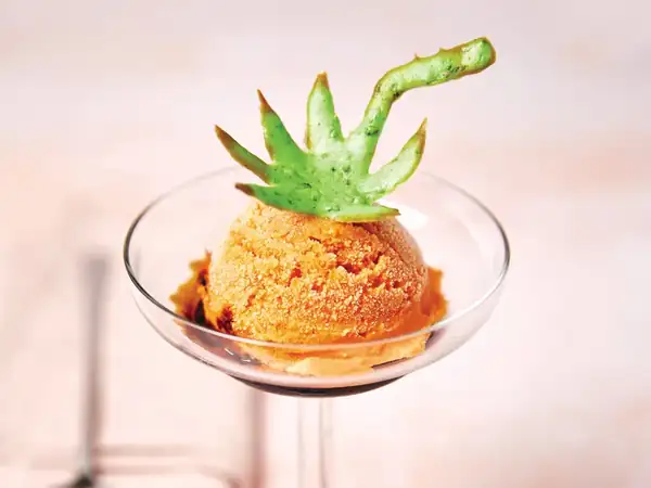 Tomato ice cream with olive oil, lemon and pastries