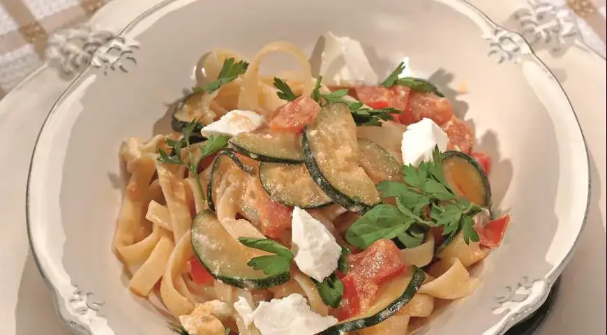Fettuccine with zucchini, tomatoes, and feta