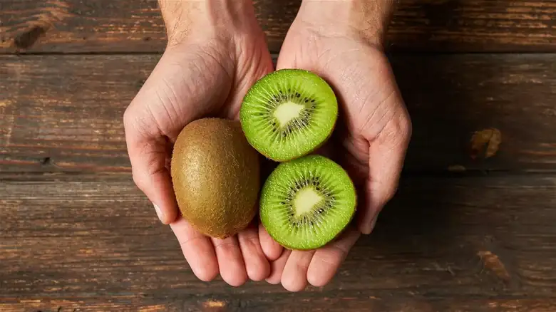 A Glass Cup Is The Genius Way To Peel Kiwis Without Tools