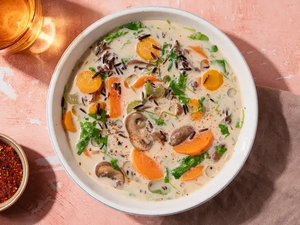 Cozy wild rice soup with sweet potato and mushrooms