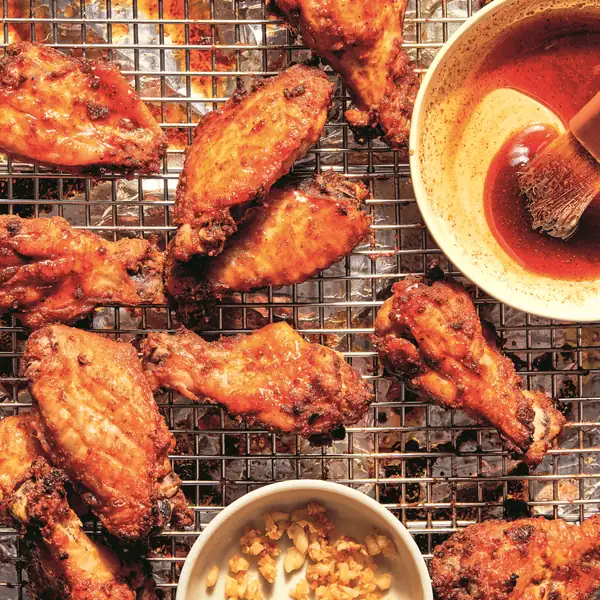 Crispy Baked Wings With Berbere Honey Glaze and Fried Garlic