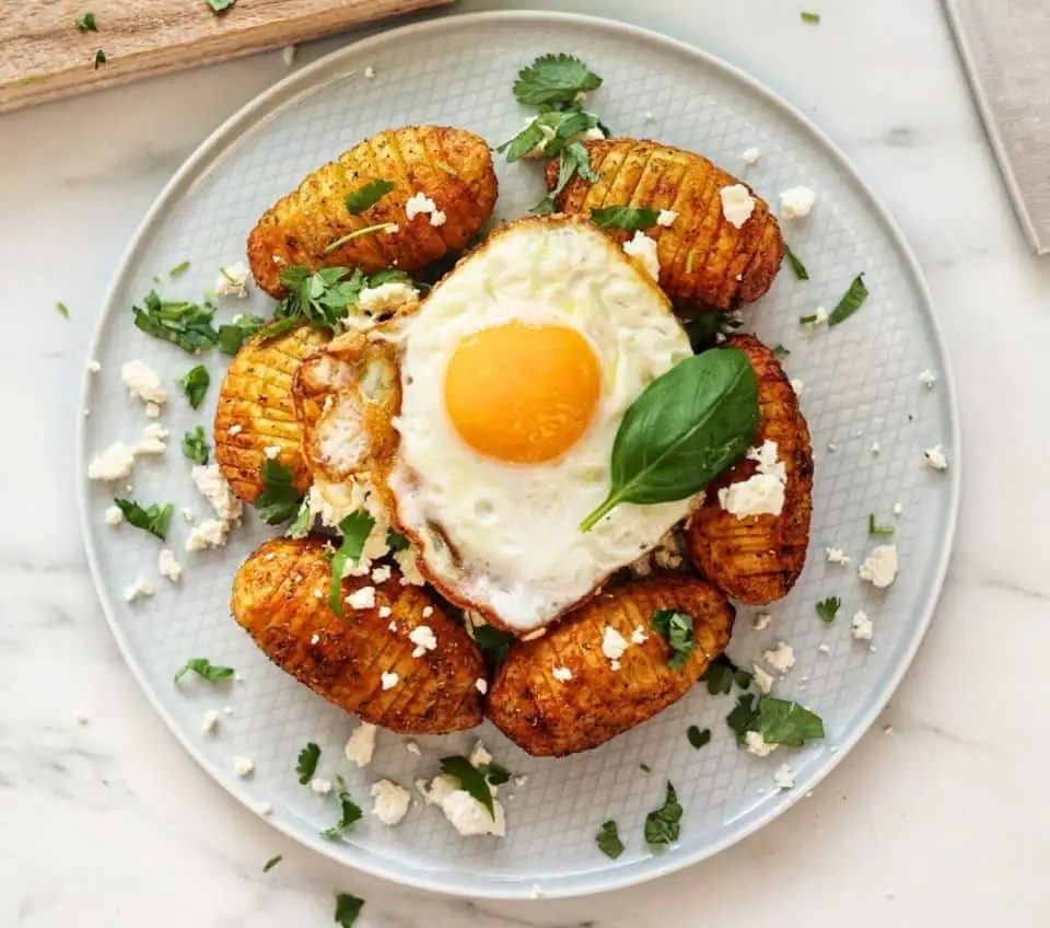 Hasselback Potatoes with Fried Eggs & Cheese