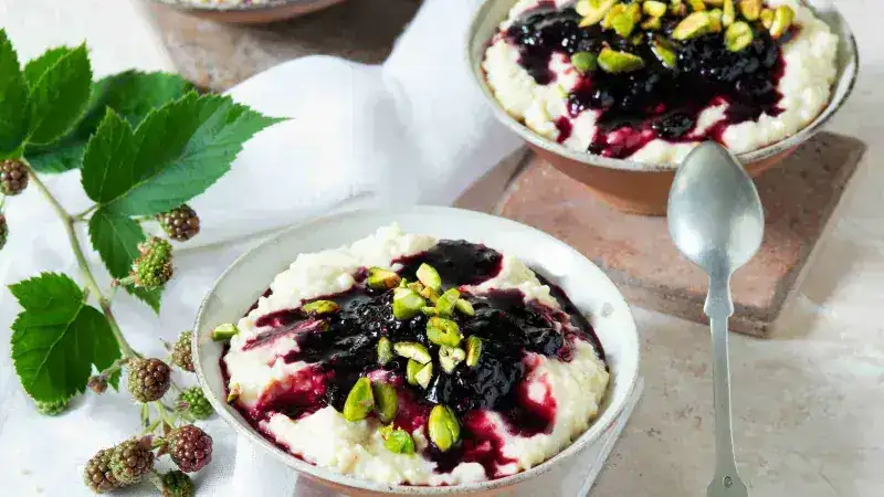 Sweet millet with blackberry compote