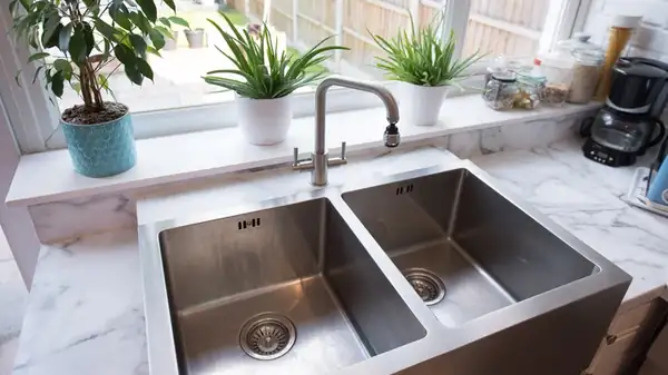 The Sneaky Reasons Why Your Kitchen Sink Stinks