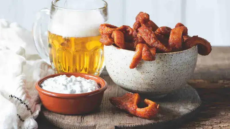 Buffalo pork ears with blue cheese sauce
