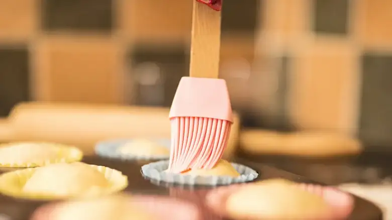 You Don't Need A Kitchen Brush If You Have Parchment Paper By Your Side