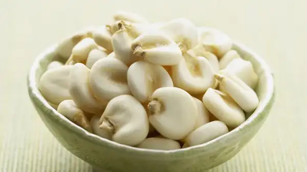 How does nixtamalized corn differ from regular corn?