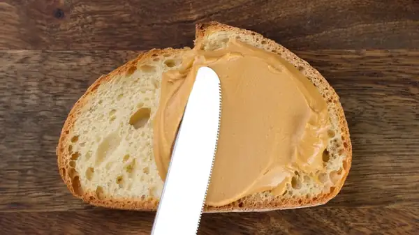 The Secret To Better Peanut Butter Sandwiches Is Already In Your Fridge