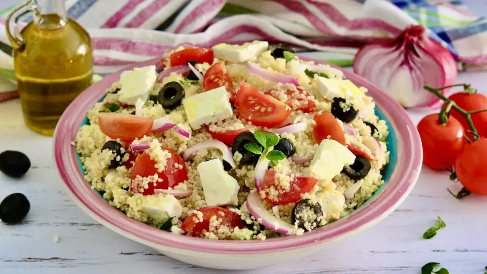 Greek-style couscous with feta, olives, and cherry tomatoes