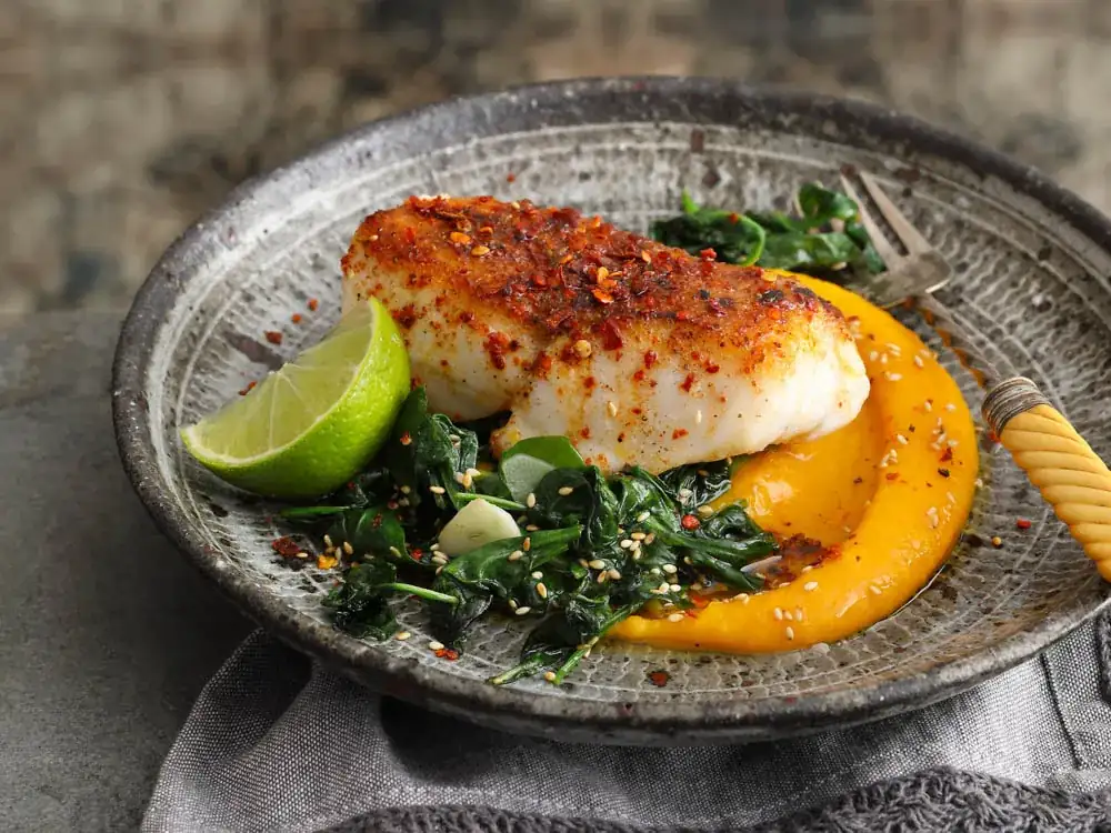 Red snapper with Ras el-Hanout on pumpkin and apricot cream & sesame spinach