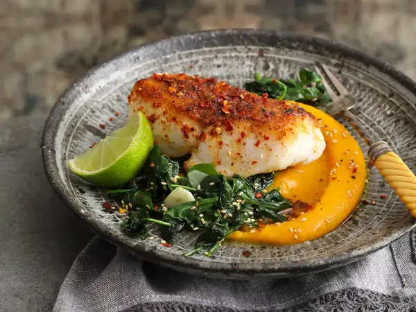 Red snapper with Ras el-Hanout on pumpkin and apricot cream & sesame spinach