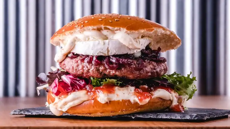 Top your next burger with this luxurious, creamy cheese to take it to the next level.