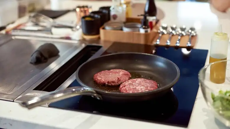 The Oil Mistake You've Been Making With Stovetop Burgers