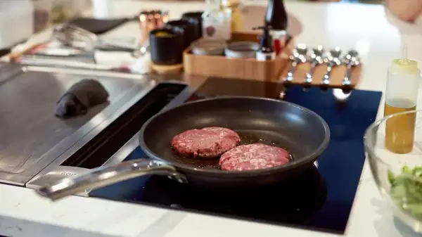 The Oil Mistake You've Been Making With Stovetop Burgers