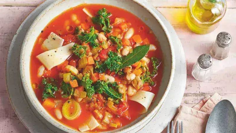 Thick soup with beans and pieces of lasagna