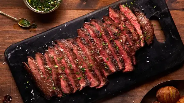 Why You Should Opt For One Large Steak When Cooking For A Crowd